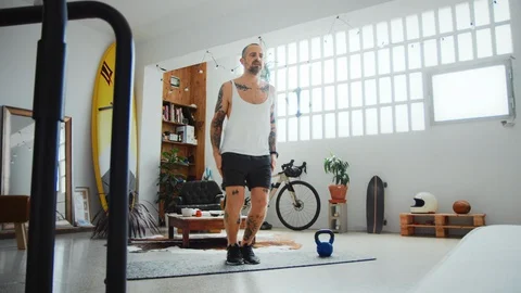 Young healthy man workout exercise indoors at home Stock-Footage 129318384