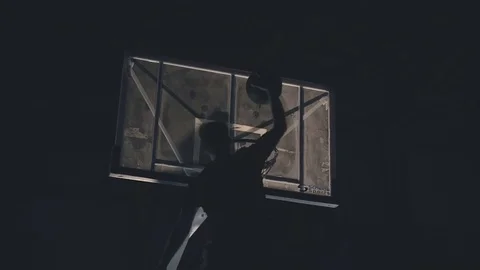 Young high basketball player throws the ball into the ring Stock Footage 76599385