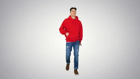 Young hip hop dancer stops dancing to answer the call/ on gradient background. Stock Footage 130704096