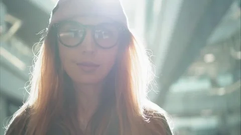 A young hipster female portrait in the big mall. Sun Stock Footage