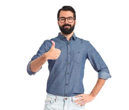 Young hipster man with thumb up Stock Photos