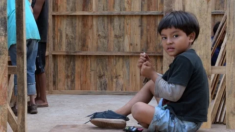 Young hispanic boy smiling at camera in Guatemalan village Stock Footage 125868419