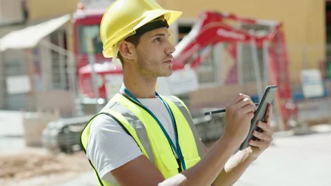Young hispanic man architect drawing on touchpad at park Stock Footage 225070010