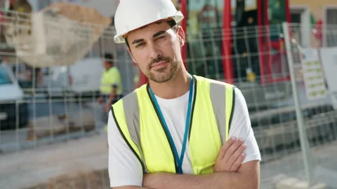 Young hispanic man architect smiling confident standing with arms crossed g.. Stock-Footage 229552959