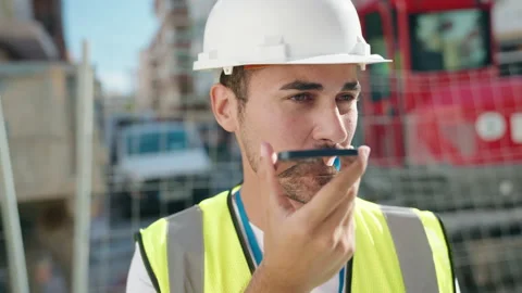 Young hispanic man architect talking on smartphone at street Stock Footage 225055658