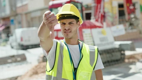 Young hispanic man doing negative gesture with thumb down at park Video stock 220153424