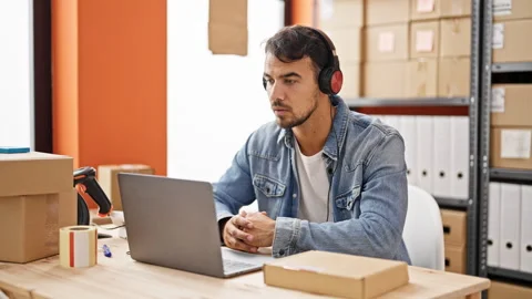 Young hispanic man ecommerce business agent having video call stressed at o.. Stock Footage 246127352