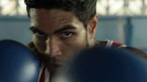 Young hispanic man exercising in boxing gym Stock Footage 11263264