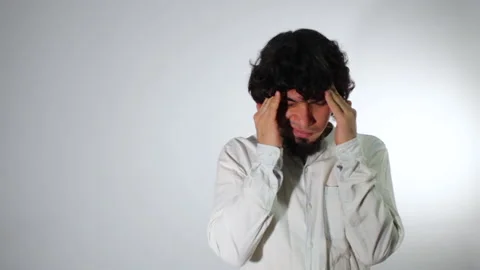 Young Hispanic man feeling stress, headache, frustration and tiredness 動画素材 142846570
