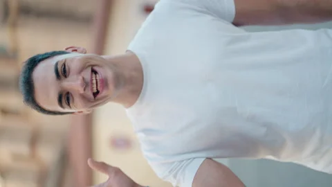 Young hispanic man smiling confident speaking at street Stock Footage 221691007