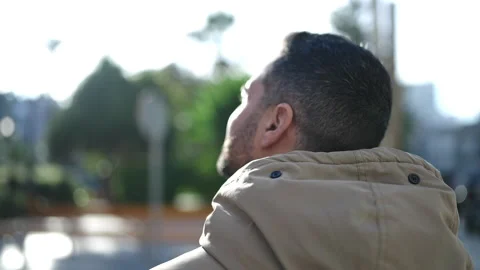 Young hispanic man standing on back view at park Stock Footage 232875999