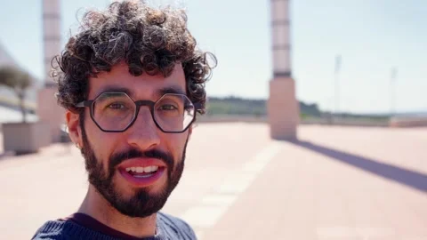 Young hispanic man talking to camera Stock Footage 269629586