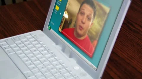 Young Hispanic Man Video Chatting on Laptop Stock Footage