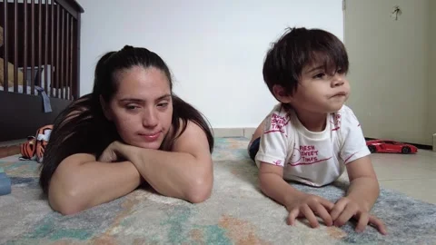 Young hispanic mom playing with her son Video stock 243176460