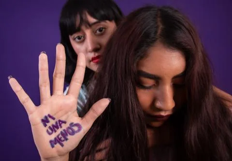Young hispanic woman campaigning against gender based violence Stock Photos