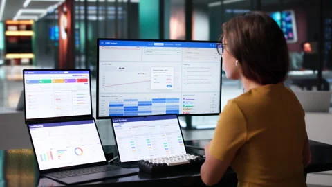 Young Hispanic Woman Using CRM Software Stock Footage 344716323