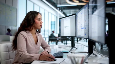 Young Hispanic Woman Using Document Management Software At Office Stock Footage 336375925