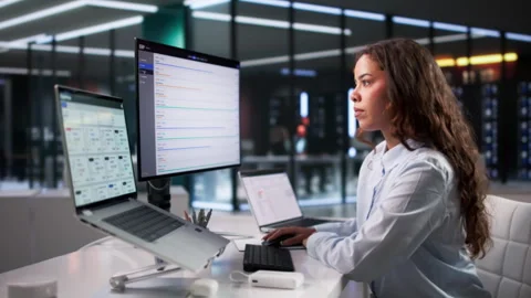 Young Hispanic Woman Using Laptop Stock Footage 336377112