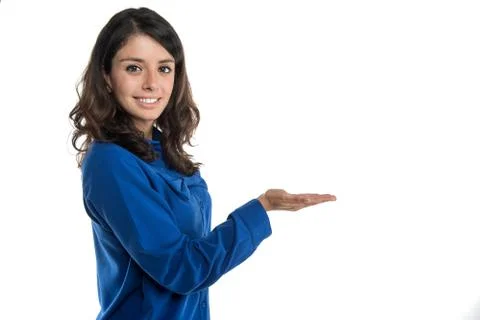 A young hostess shows an empty space. Stock Photos