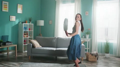 Young Housekeeper Is Dancing with Cleaning Brush at Home Stock Footage 164732550