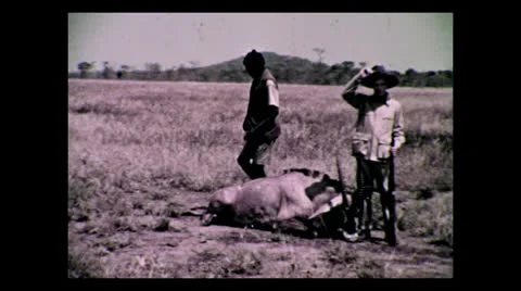Young hunter poses besides oryx, Tanzania 1937 動画素材 27179730