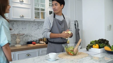 The young husband cooking breakfast in kitchen Stock Footage 87246470