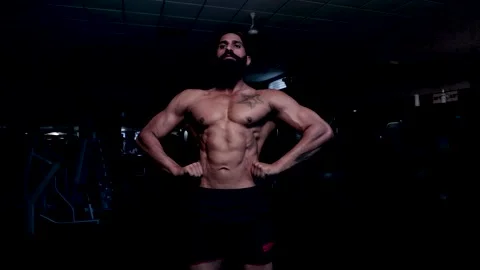 Young Indian beard Man showing His upper body muscles Stock Footage 149484202