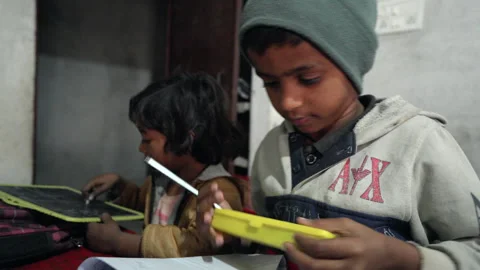 Young Indian Boys in the Classroom at Elementary School in Rural India Stock Footage 243286969