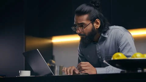 Young Indian businessman checking reports and reading good news email, success Stock Footage 316836894