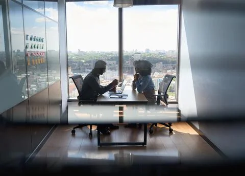 Young indian ceo having interview with African American manager hiring for job. Stock Photos