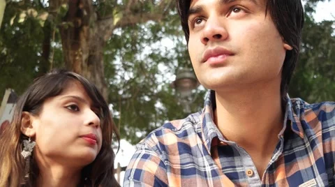 Young Indian couple hanging outdoor Stock Footage 59364570