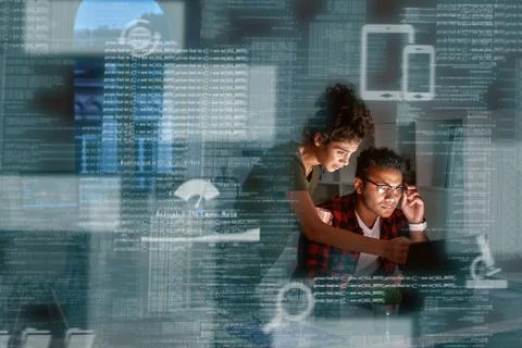 Young indian developer and his project manager discussing application code 스톡 사진