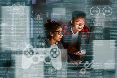 Young indian game developers thinking how to track new events Stock Photos