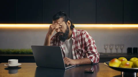 Young Indian IT specialist having laptop issues, encountering program error Stock Footage 313281283