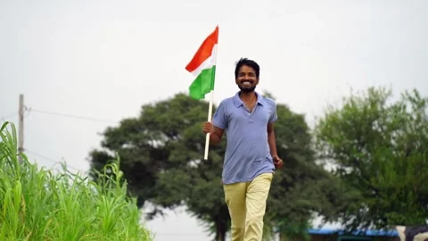 Young Indian man holding, waving or Stock Video Pond5