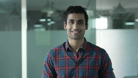 Young indian man smiling and looking at camera. 動画素材 170233225
