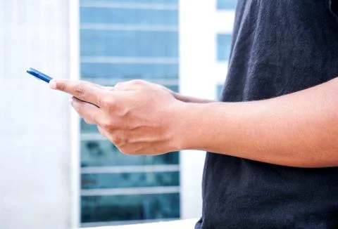 Young Indian man using smartphone Stock Photos