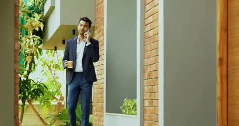 Young Indian professional expressing frustration due to mobile network failure Stock Footage 342693029