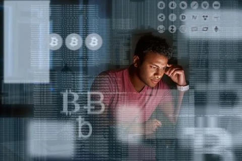 Young indian programmer thinking how to get more cryptocurrency 写真素材