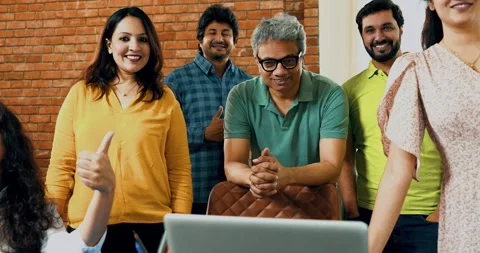 Young Indian startup team standing together celebrating success in camera Stock Footage 342510697