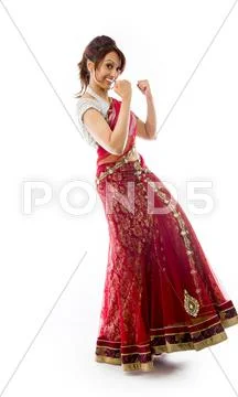 Young Indian woman celebrating success Stock Photos