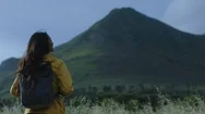 Young Indian Woman Hiking Enjoying Calm Scenic Mountain Landscape Wind Blowing Stock Footage