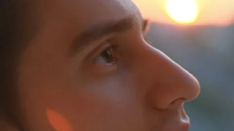 Young inspired guy looking to the skies at sunset Stock-Footage 273494418