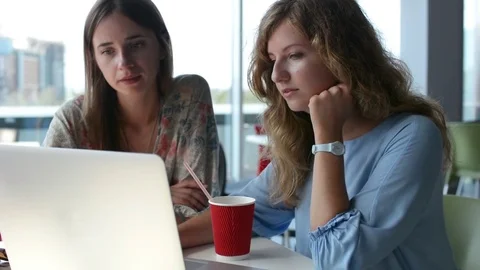 Young Interior Designers Talking about Project in Modern Cafe Видео 80267329