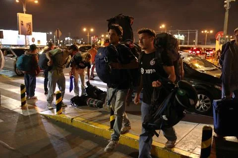 Young Israelis queue to board a flight to Tel Aviv, Lima, Peru - 11 Oct 2023 Stock Photos