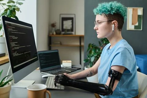 Young IT specialist working with security codes 스톡 사진