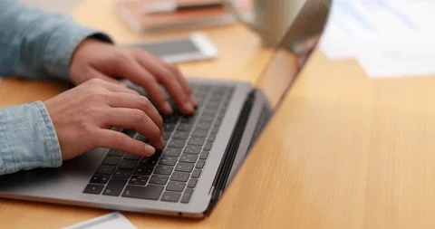Young Japanese man working remotely from home Stock Footage 128406420