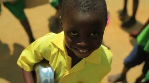 Young Kenyan girl with kitchen appliances smiling. Stock Footage