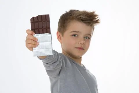 Young kid happy with his sweet Stock Photos