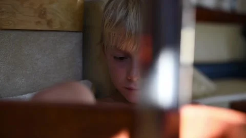 Young kid playing on smartphone. Stock Footage 137673596